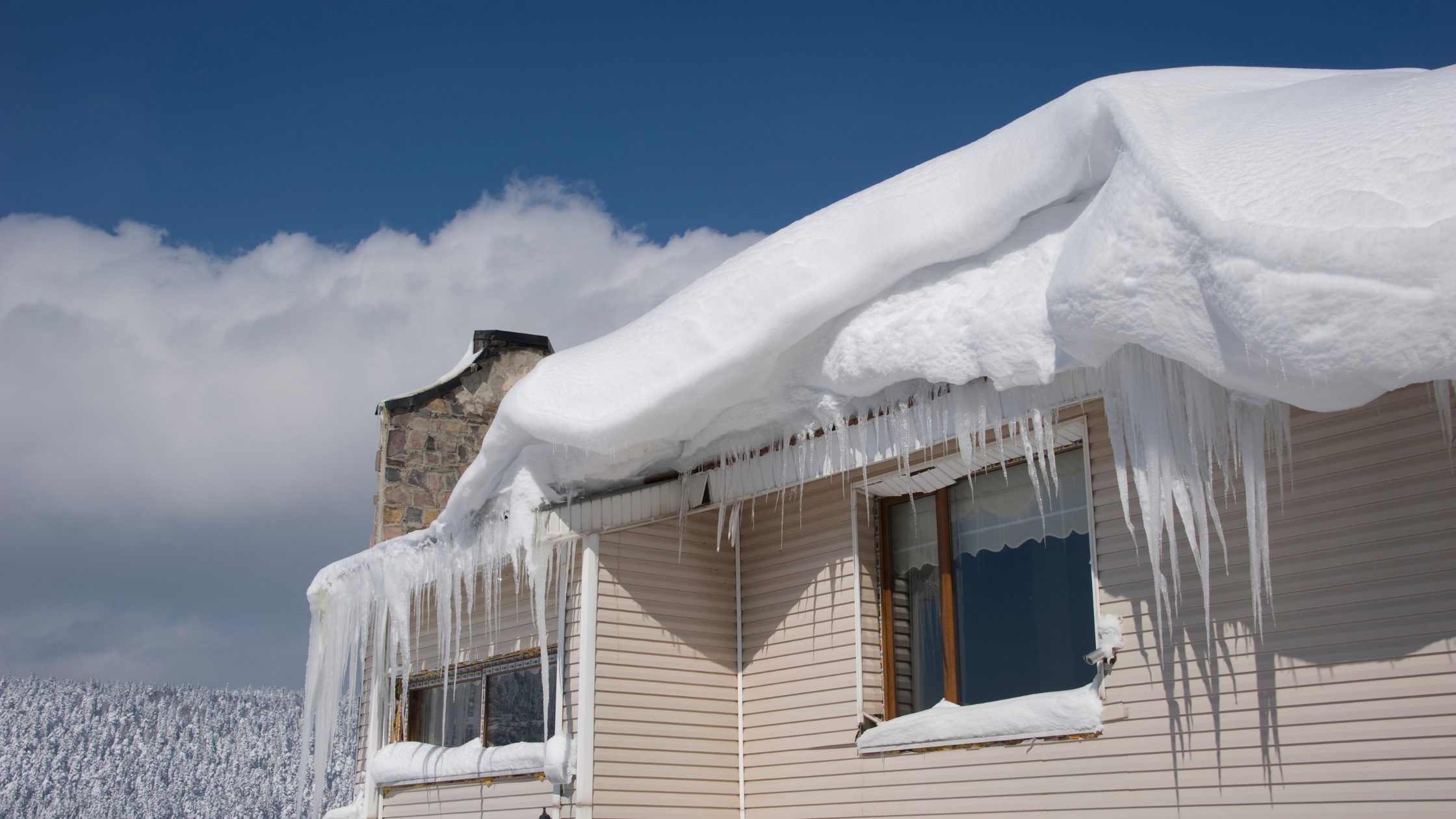 Massive ice dams on midwestern home
